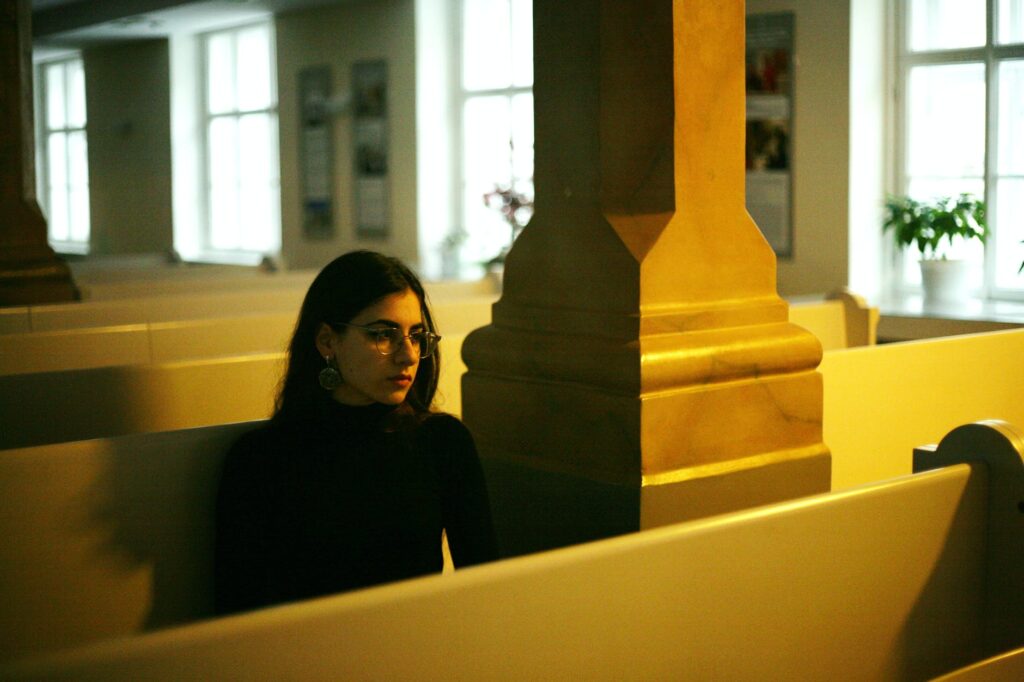 woman sitting on bench